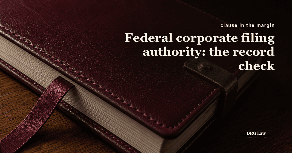 Corporate records and a filing confirmation on a walnut desk