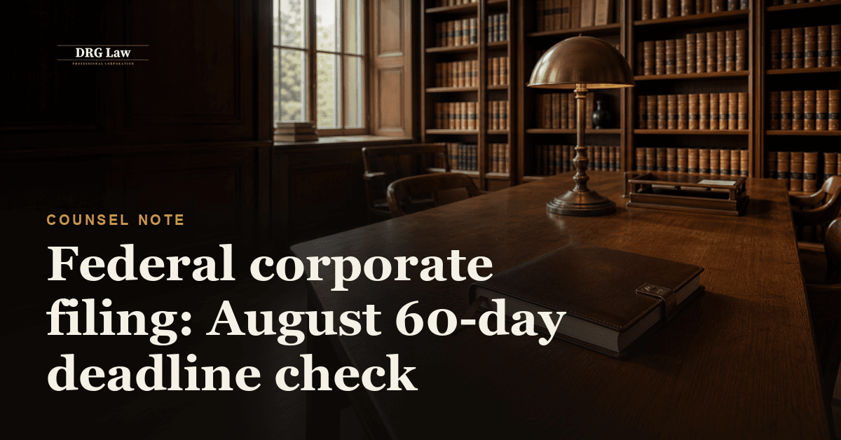 A federal corporate minute book open on a desk beside filing papers